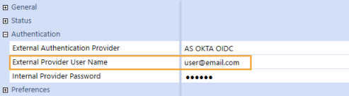 The System Security user configuration page has a grid with row headings that have a blue background with blue text and can be expanded to display fields with a white background and black text. Under the Authentication row heading, the External Provider User Name field has an email address.